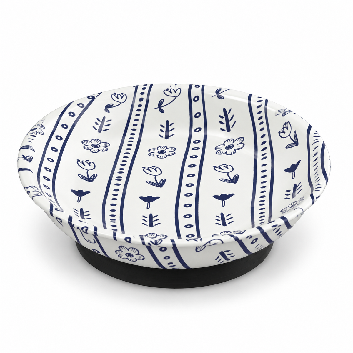 Blue-and-white floral magnetic ORT bowl and needle minder with a shallow round dish and black base