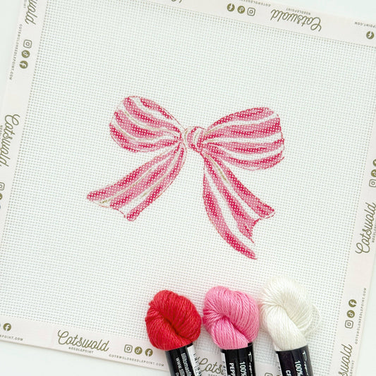 Pink and red striped Christmas bow needlepoint canvas by Cotswold Co Designs, artisan printed 18 mesh design