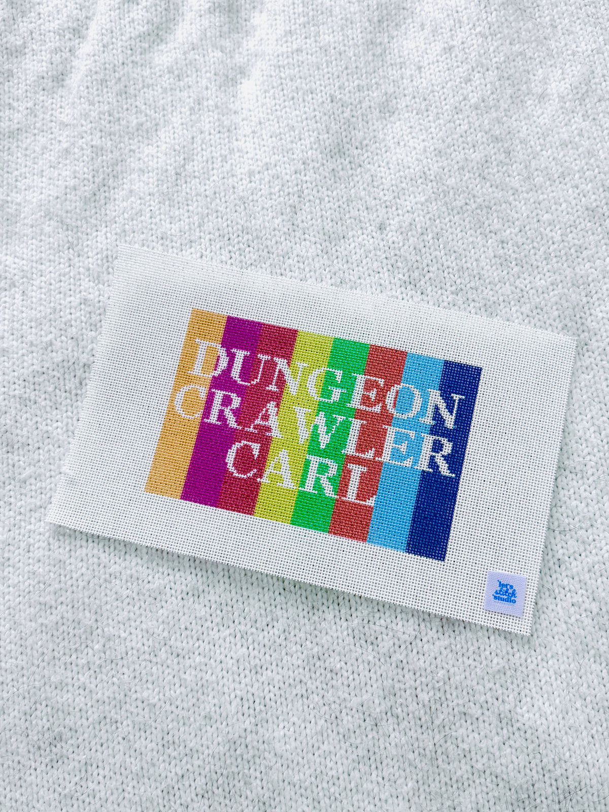 Let's Stitch Studio Dungeon Crawler Carl needlepoint canvas detail