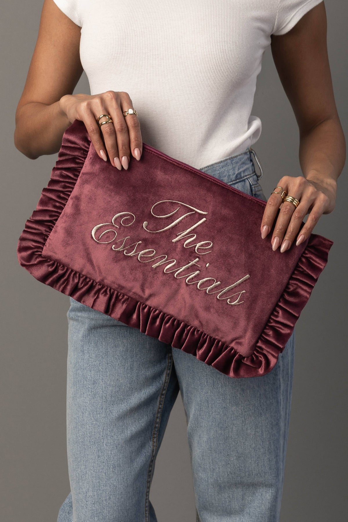 The Essentials Ruffle mauve needlepoint travel pouch detail